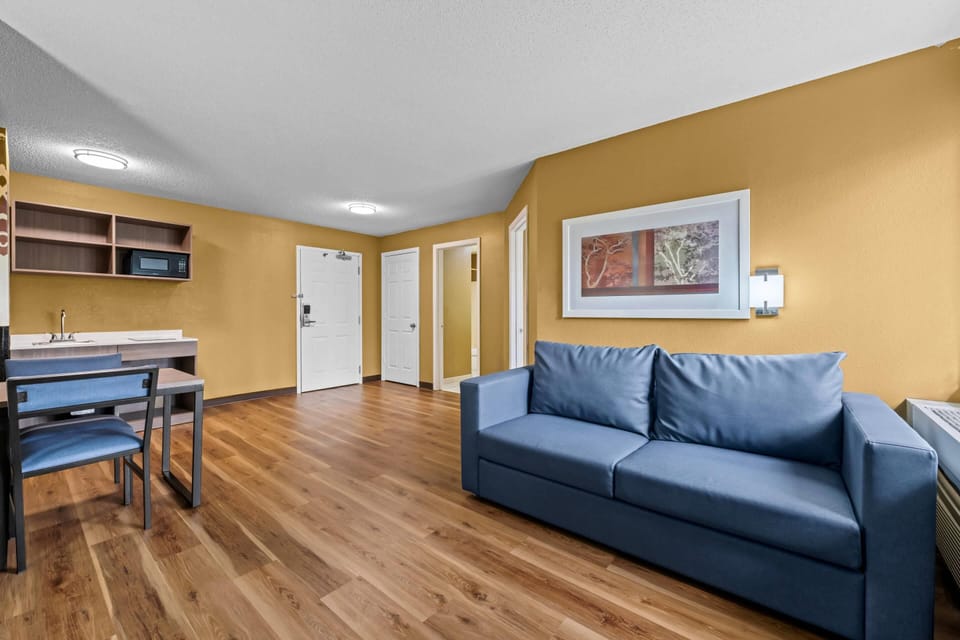 Suite, Non Smoking (1 Queen Bed) | Desk, laptop workspace, blackout drapes, iron/ironing board