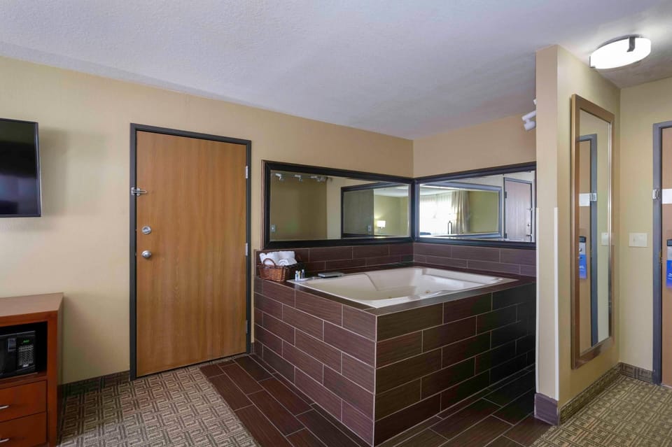 Desk, blackout drapes, iron/ironing board (on request), cribs (free)