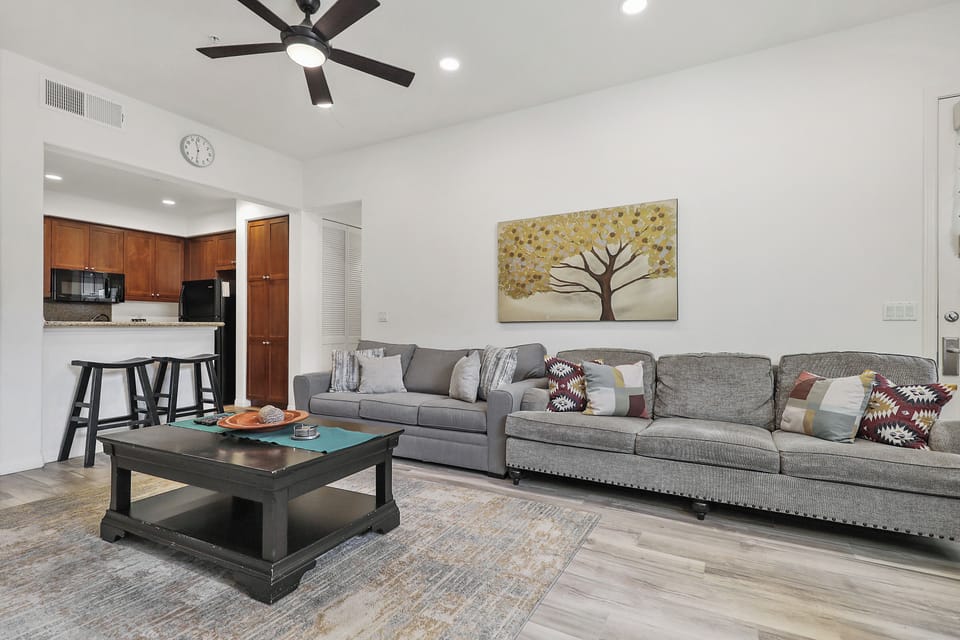 Living room with 55" Samsung 4K Smart TV, Cable TV, Fireplace and Dining area