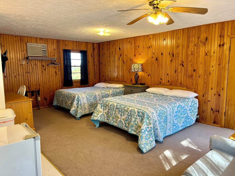 Deluxe Room, 2 Queen Beds, Partial Lake View | Individually decorated, individually furnished, desk, laptop workspace