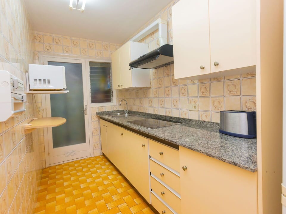 Cabinetry, Countertop, Building, Furniture, Kitchen Appliance, Kitchen Stove, Kitchen, Wood, Exhaust Hood, Drawer