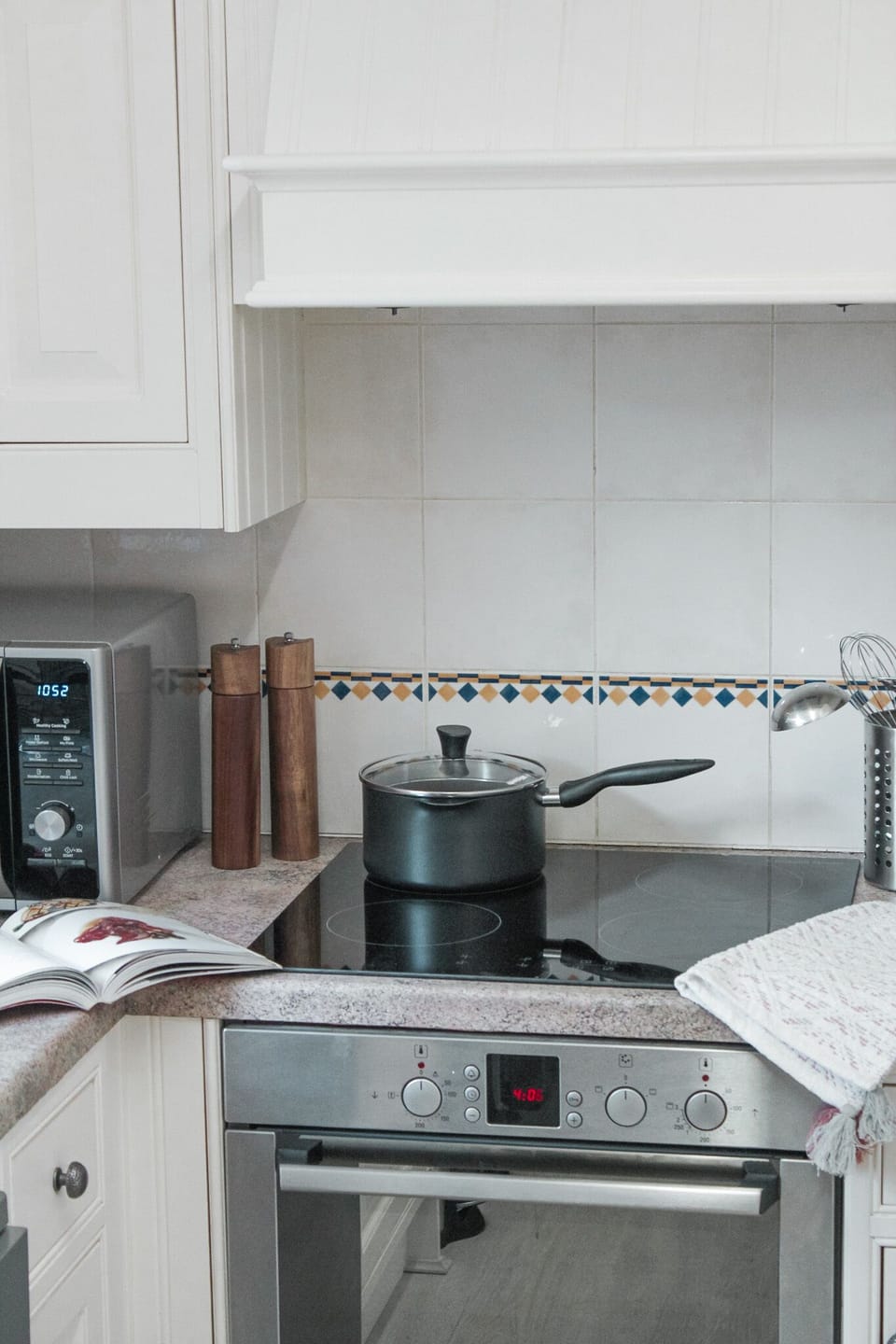 Oven, induction hob and microwave