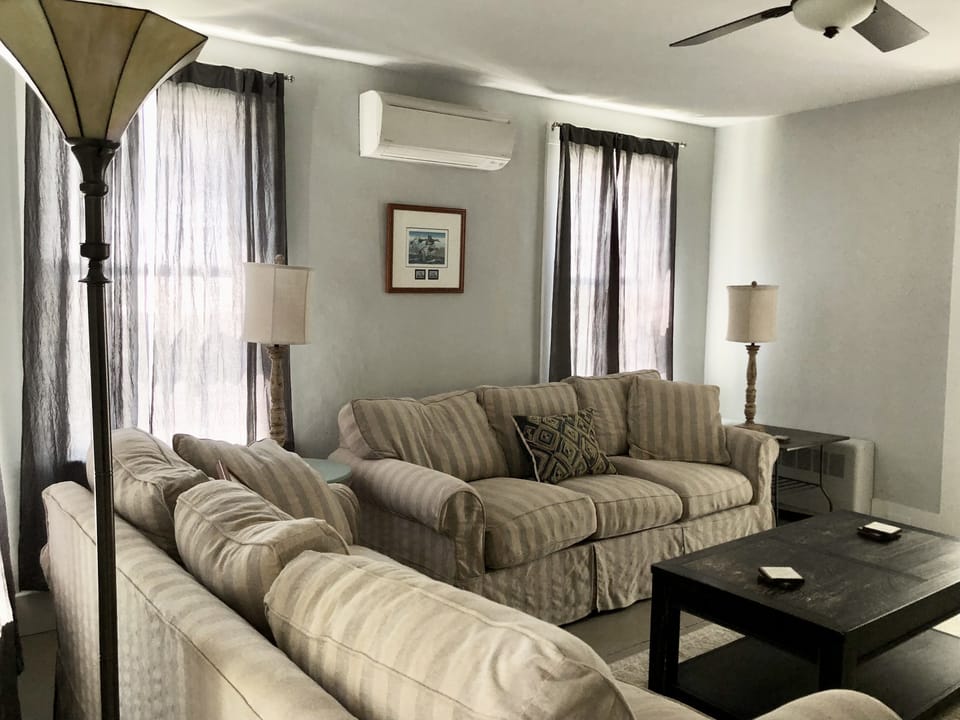 Comfy and cool in the living room with a 55" TV.  