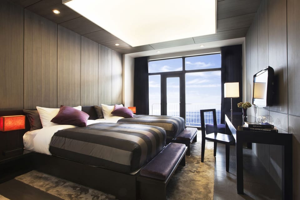 Premium bedding, down comforters, minibar, in-room safe
