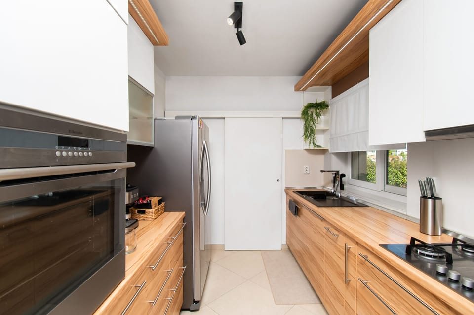 Villa | Private kitchen | Fridge, microwave, oven, stovetop