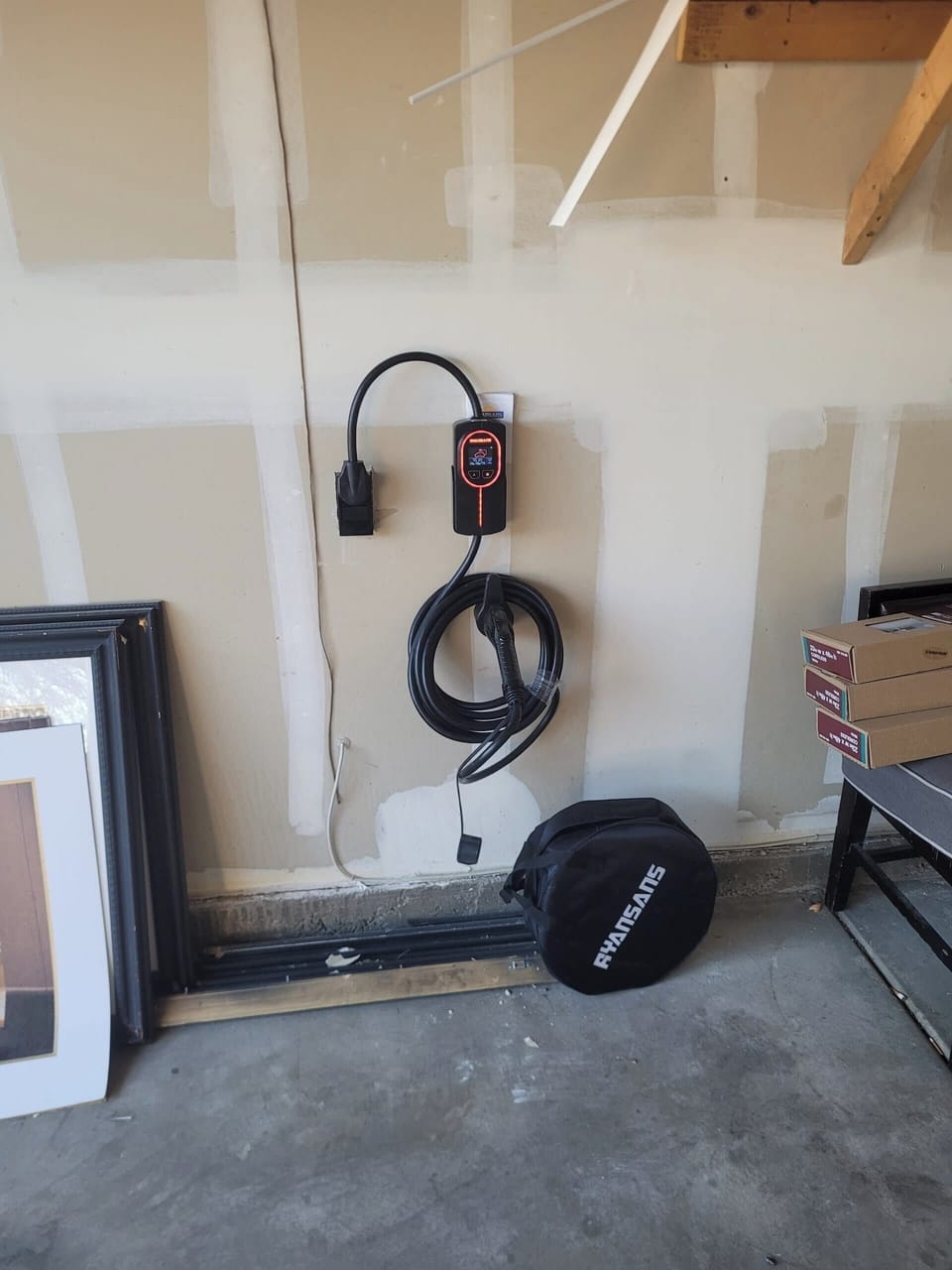 EV Charger 220v 40A Level 2 charger is available in the garage.