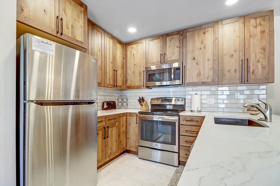 Condo, 2 Bedrooms | Private kitchen | Coffee/tea maker, fridge, oven, toaster