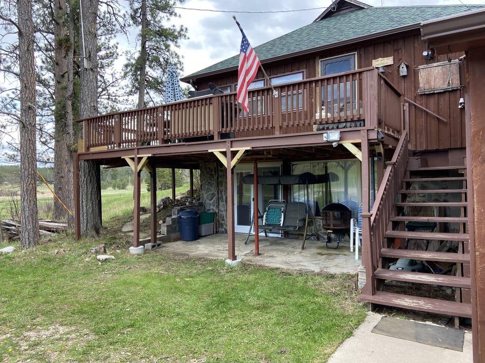 Southeast facing, deck, garage, stairs to main entrance