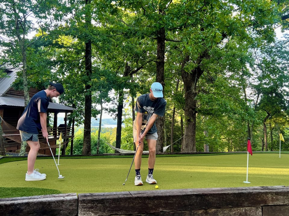 What's better than putting on your own private green with marvelous lake views.
