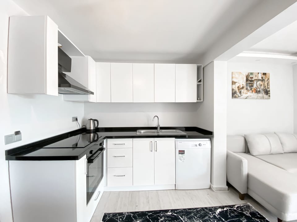 Comfort Apartment | Private kitchen | Full-size fridge, oven, stovetop, cookware/dishes/utensils
