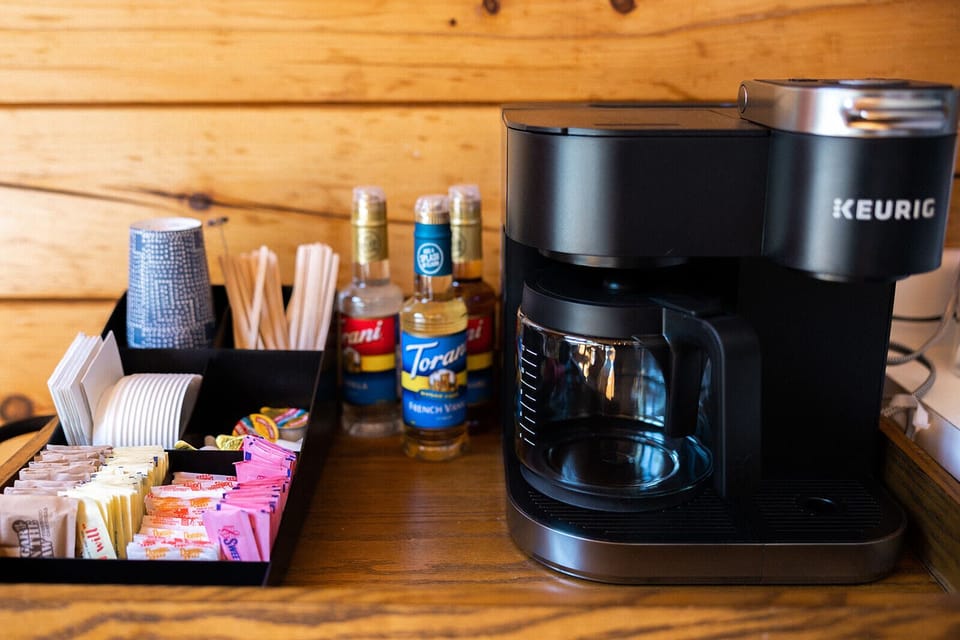 Dual Keurig coffee maker provided with a wide selection of flavors, sugars,etc. 