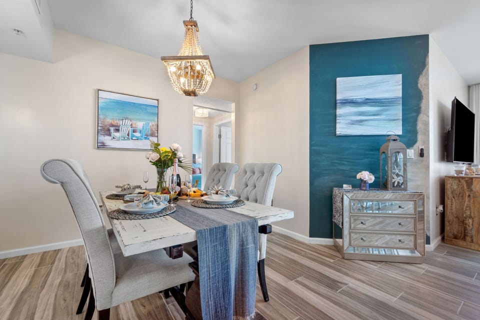 Upgraded lighting and coastal décor throughout.  Table Seating for 4