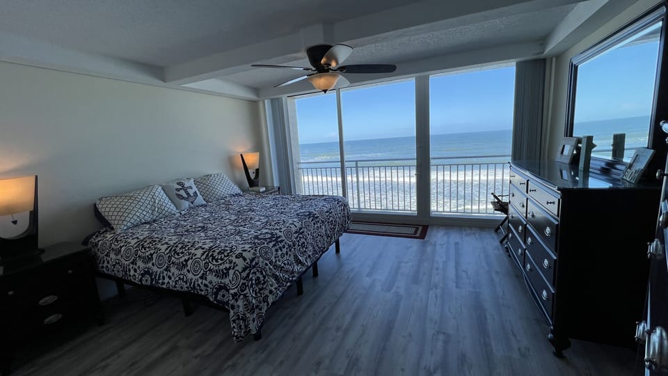 Master bedroom with a small balcony and an amazing view. 