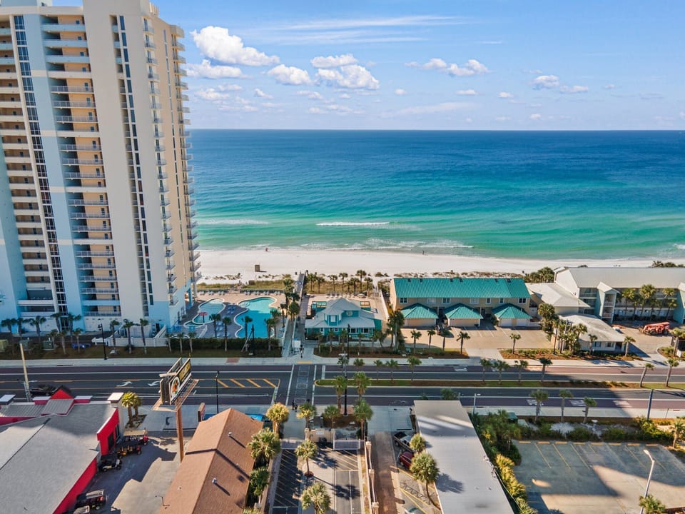 Cross the street to the beautiful white sandy beach