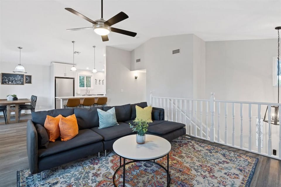 Relax in a bright, modern living room that’s perfect for movie nights or hanging out.