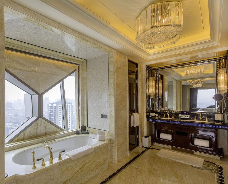 Separate tub and shower, deep soaking tub, rainfall showerhead