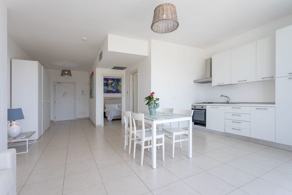 Panoramic Apartment, Sea View | Private kitchen | Fridge, cookware/dishes/utensils