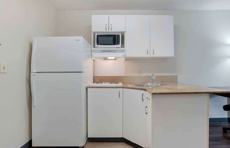 Studio, 1 King Bed, Non Smoking | Private kitchen | Full-size fridge, microwave, stovetop, coffee/tea maker