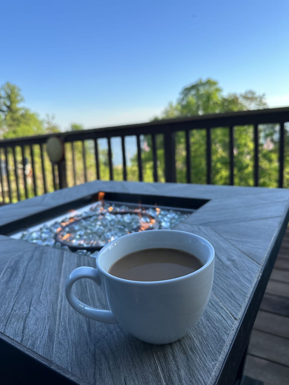 Enjoy your coffee around the cozy fire table overlooking the James River