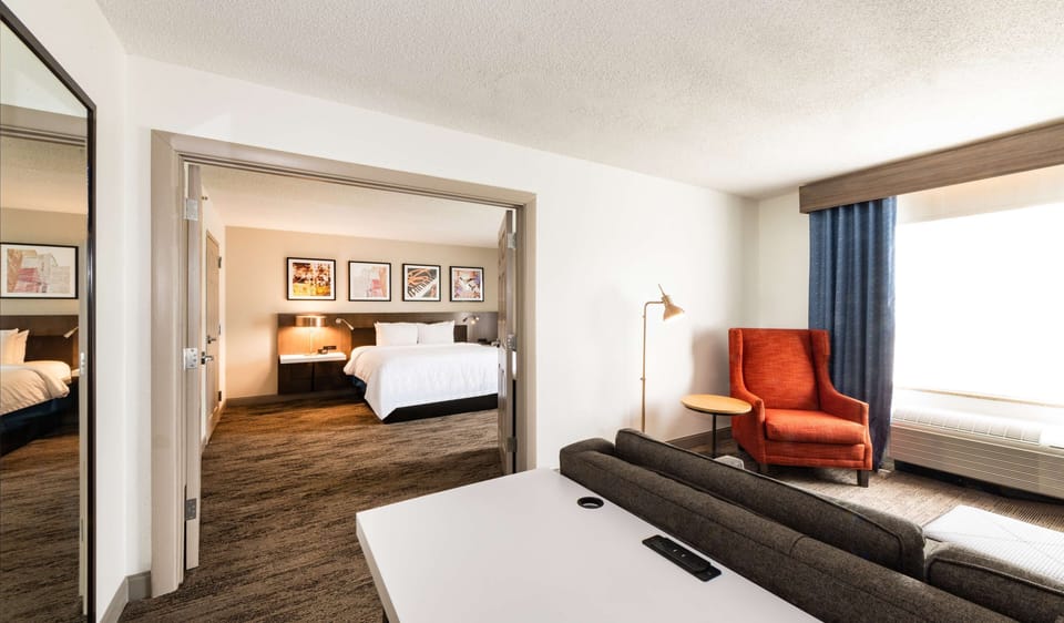 Suite, 1 Bedroom | Living area | 47-inch TV with cable channels