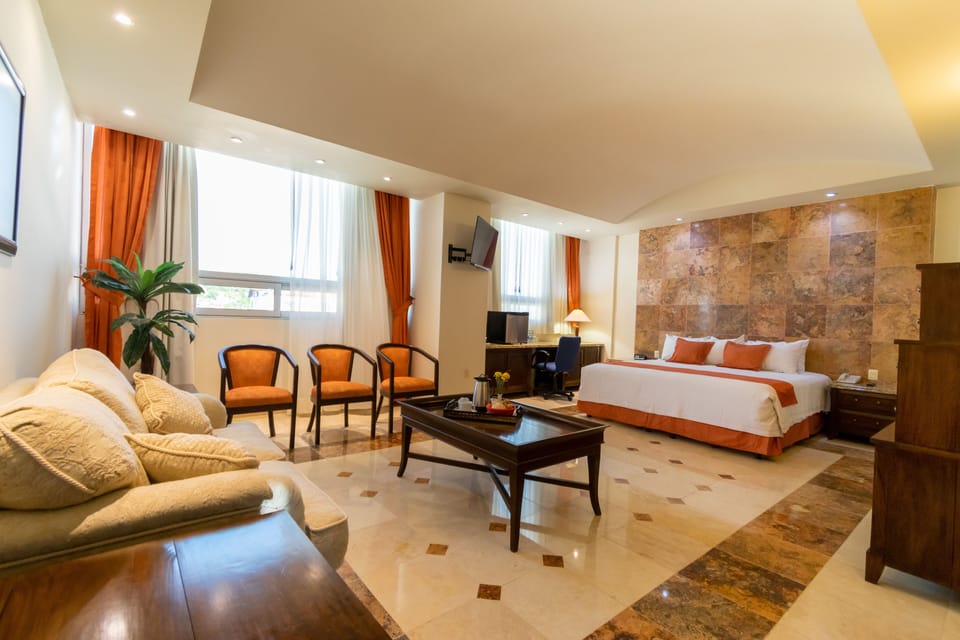 Deluxe Suite | 1 bedroom, down comforters, in-room safe, desk