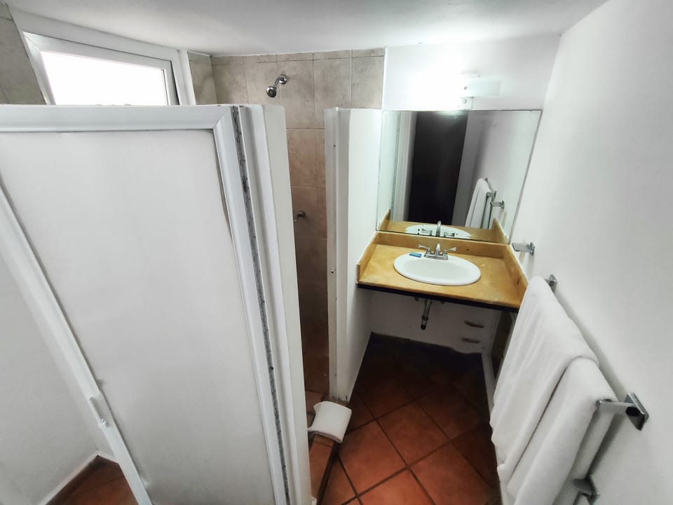 Standard Room, 2 Double Beds | Bathroom | Shower, free toiletries, towels, soap