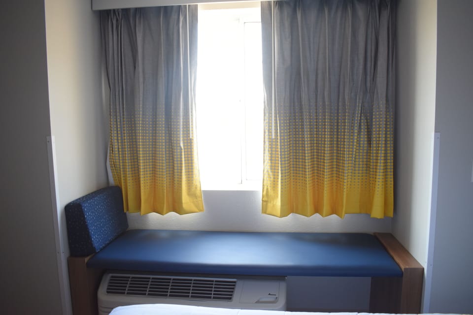 Suite, 1 King Bed, Non Smoking | Desk, laptop workspace, blackout drapes, iron/ironing board