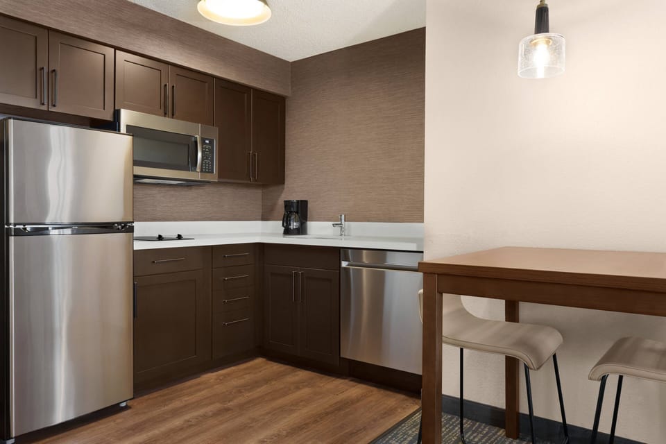 Suite, 1 Bedroom, Non Smoking | Private kitchen | Full-size fridge, microwave, stovetop, dishwasher
