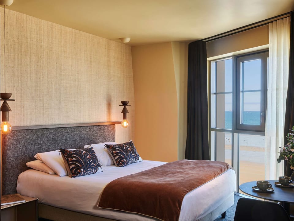 Suite, 1 King Bed with Sofa bed, Sea View | Pillowtop beds, in-room safe, desk, blackout drapes