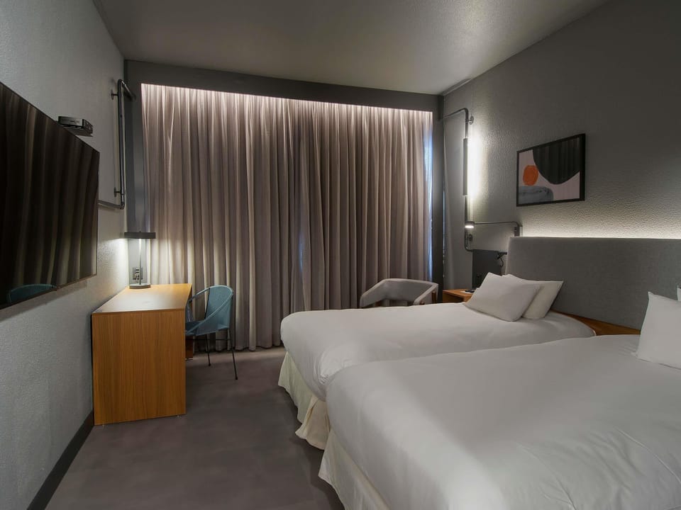 Superior Room, 2 Twin Beds | Minibar, in-room safe, desk, laptop workspace