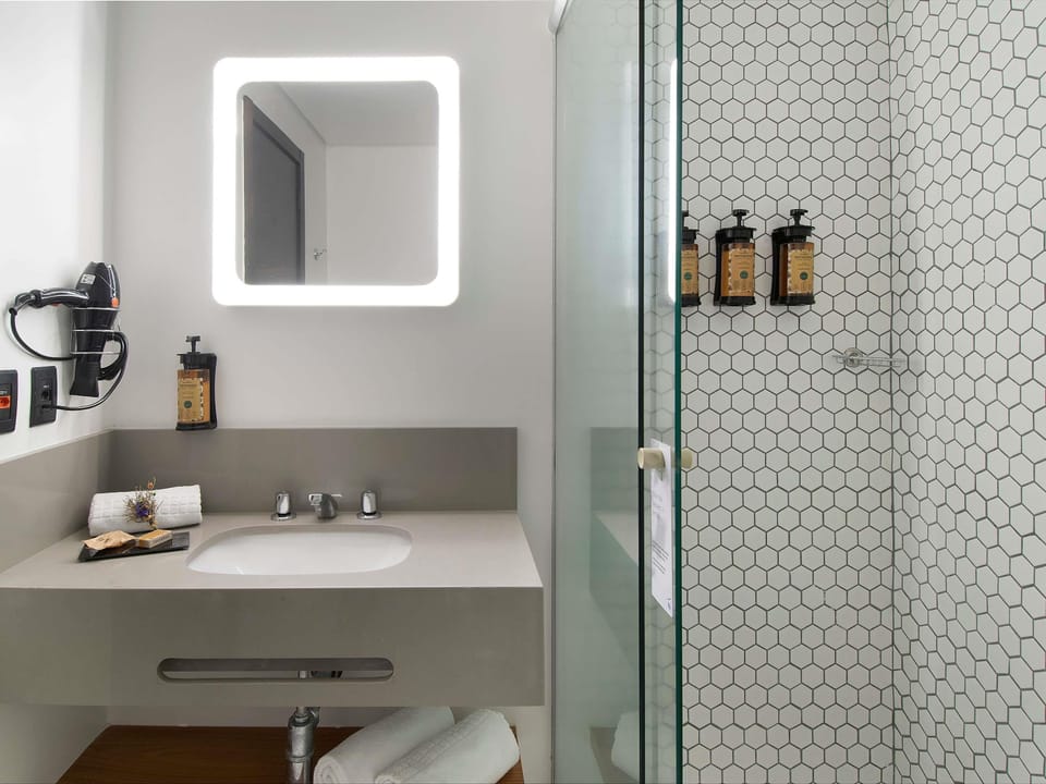Shower, eco-friendly toiletries, hair dryer, towels