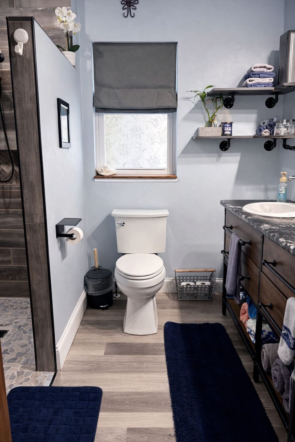 1st floor, Step free bathroom features granite countertops and double sink