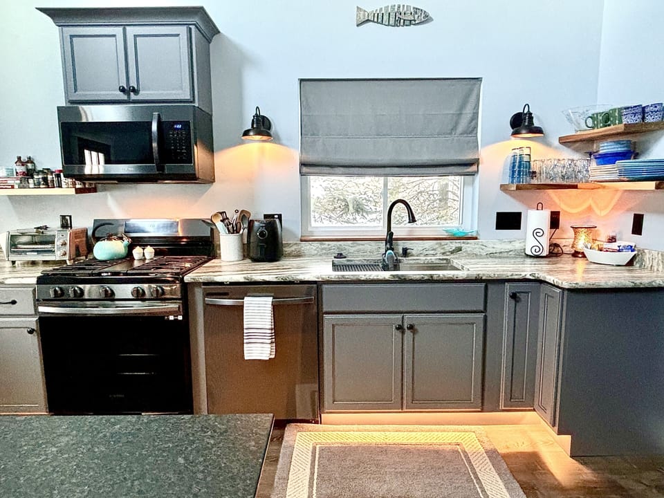 Dishwasher, PaperTowels, Airfryer, Toaster Oven, Plenty of utensils, etc.