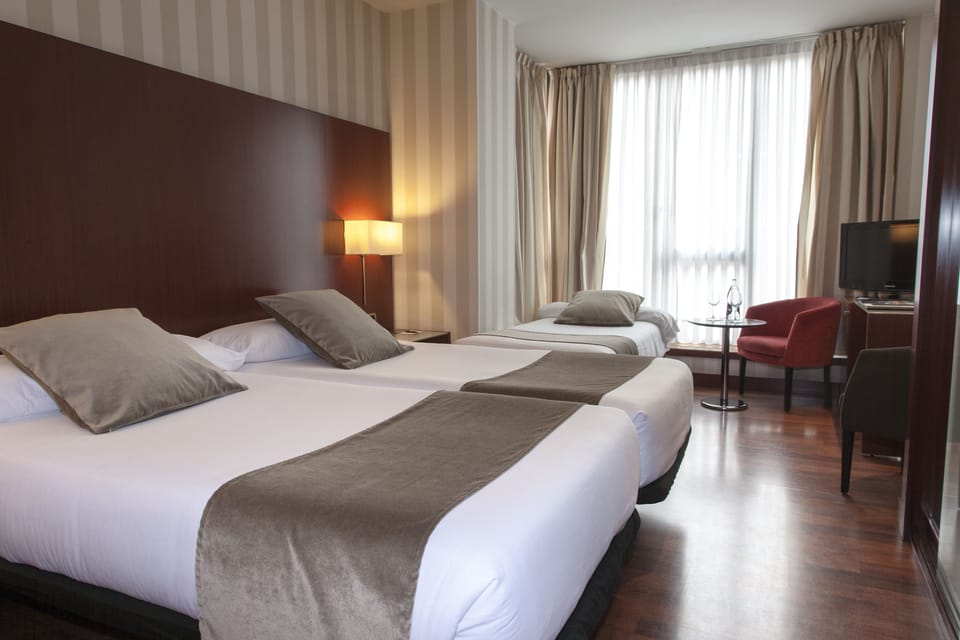 Double Room (with extra bed) | Minibar, in-room safe, desk, laptop workspace