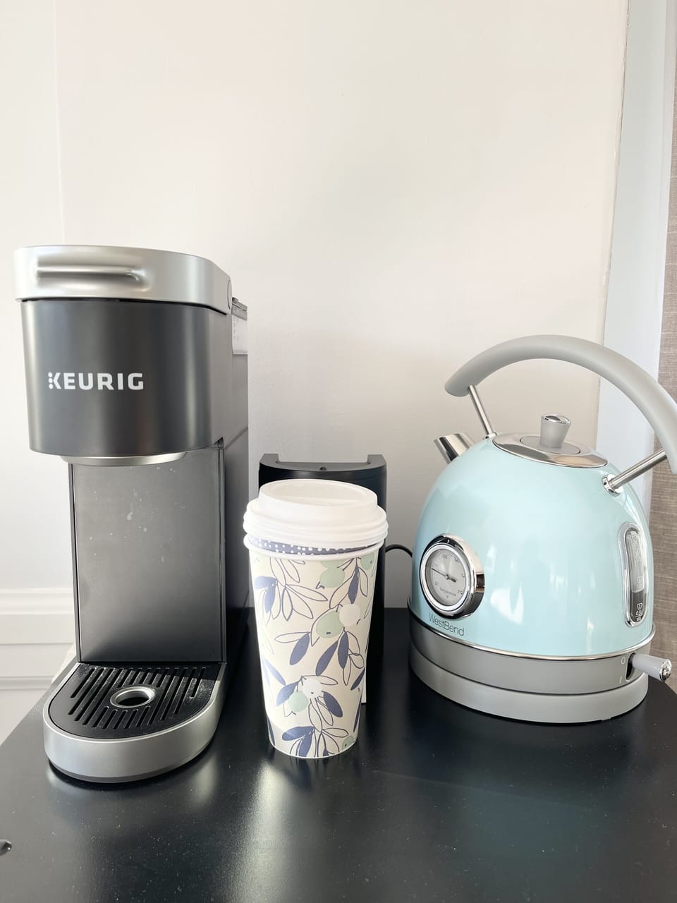 Dedicated coffee maker and electric tea kettle in penthouse. 
