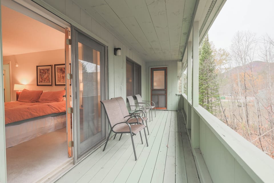 Deck off the master bedroom runs to the living area