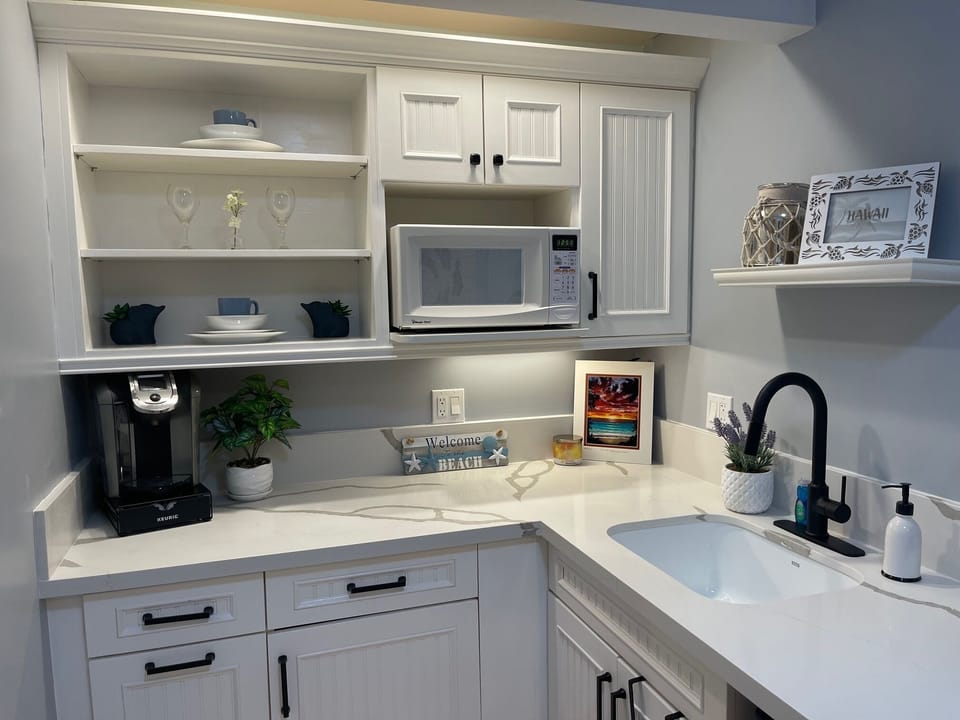 Microwave, coffee maker with K-cups, mini fridge