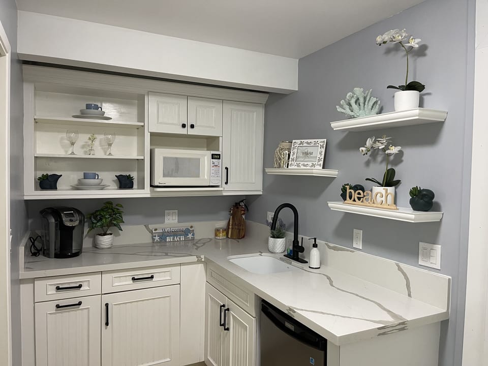 New quartz counter tops in the kitchen and bathroom