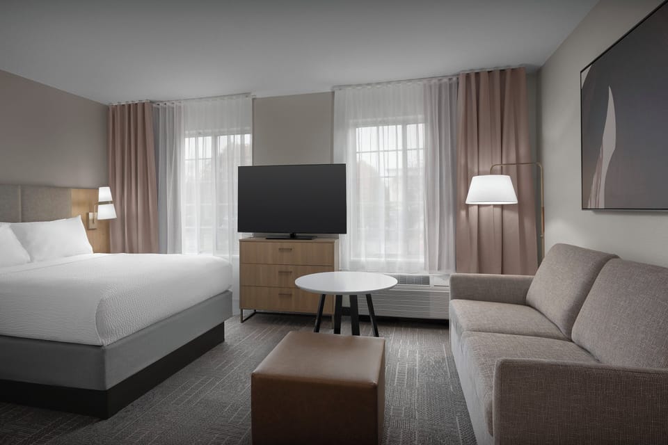 Premium bedding, desk, blackout drapes, iron/ironing board