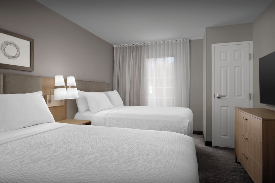 Premium bedding, desk, blackout drapes, iron/ironing board