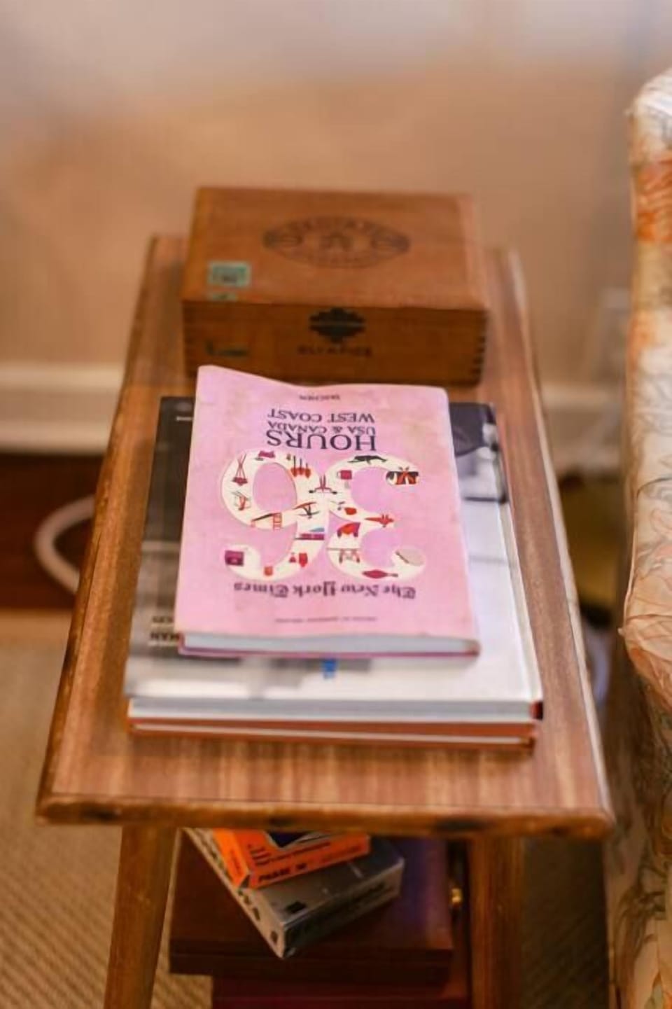 
A stylish side table with books for inspiration and a touch of charm.