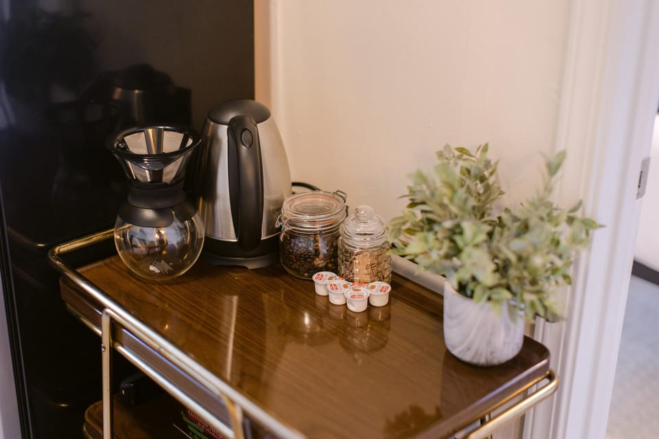 Start your mornings right with fresh coffee beans, sugar, and creamer – all provided for your perfect brew!