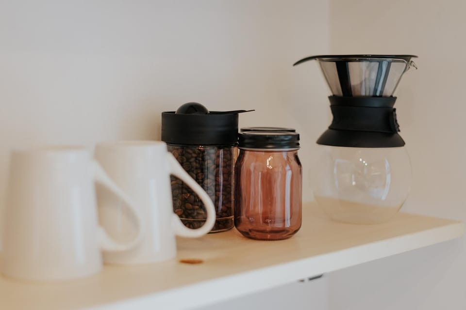 Start your day right with freshly ground coffee beans, sugar, and creamer.