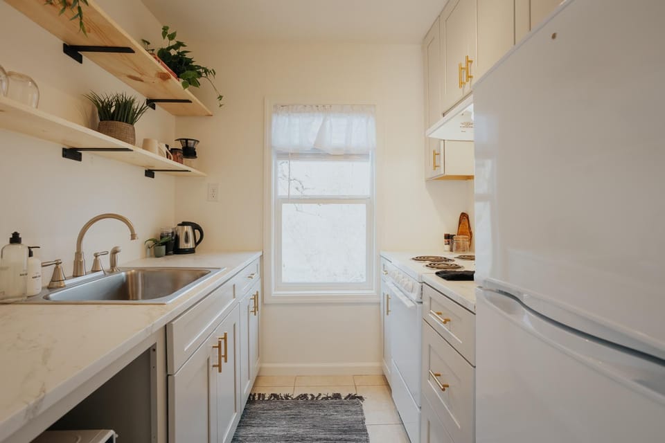Cook and dine with a view! Enjoy a fully stocked kitchen paired with breathtaking river views for a truly unique experience.