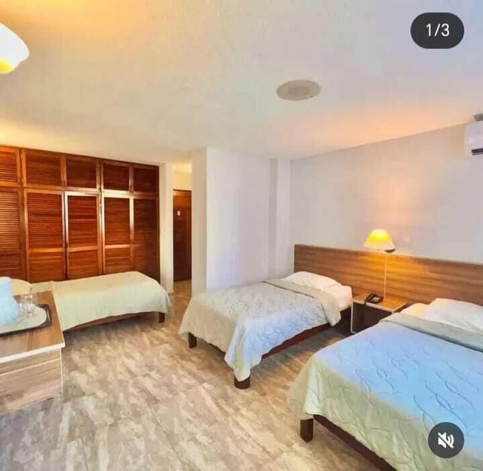 Standard Room, 3 Twin Beds | Down comforters, in-room safe, blackout drapes, WiFi (free)