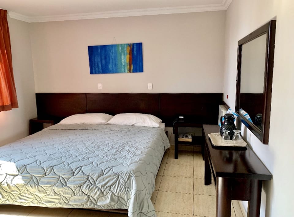 Standard Room, 1 King Bed | Down comforters, in-room safe, blackout drapes, WiFi (free)