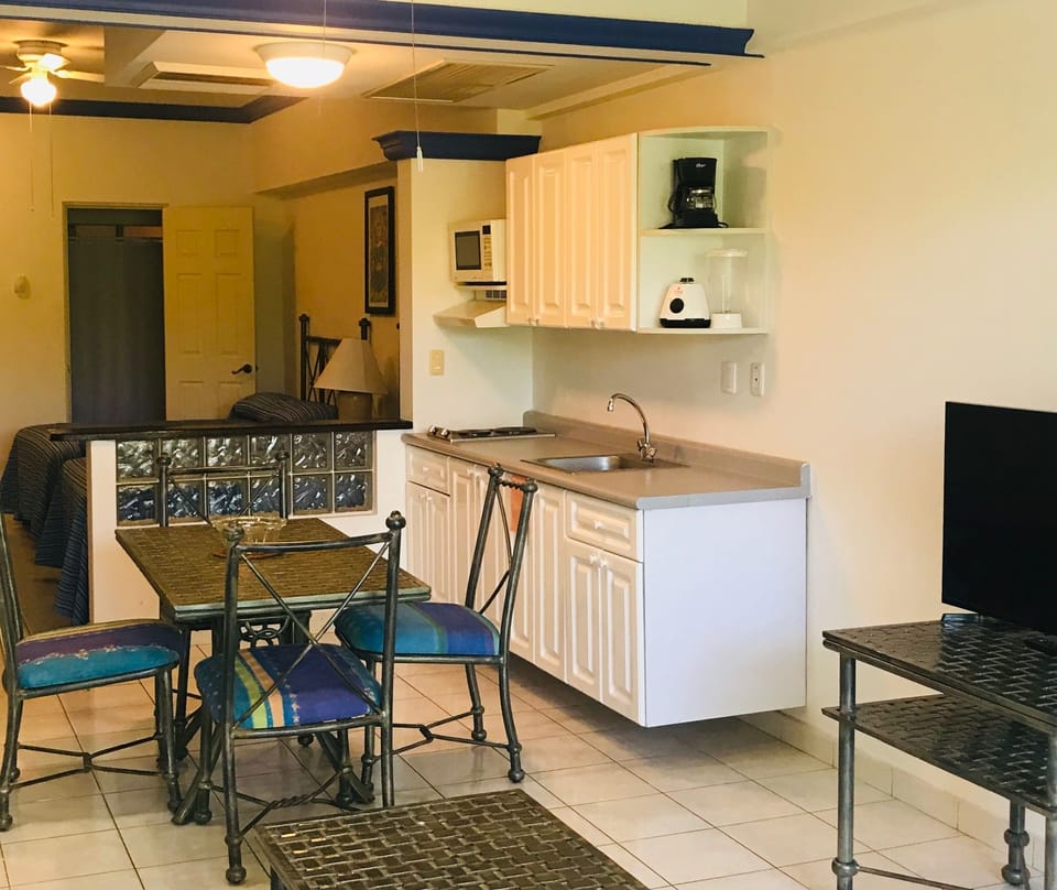 Junior Suite, 2 Double Beds, Garden View | Private kitchenette | Coffee/tea maker, full-size fridge, microwave, cookware/dishes/utensils