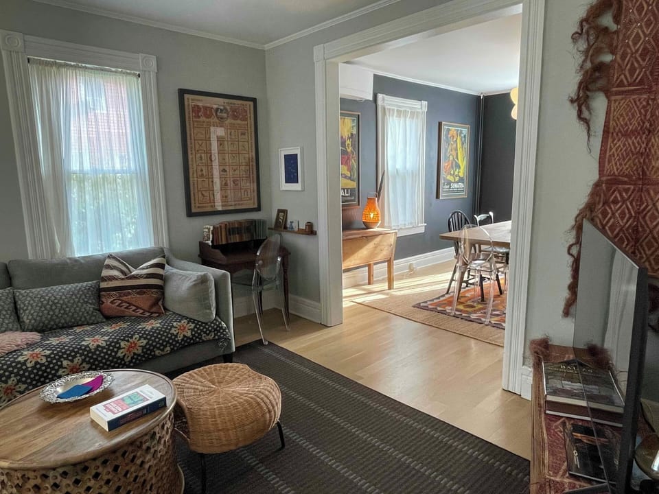 The living room flows into the dining room.