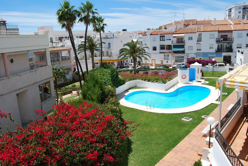 Balcony facing the communal pool