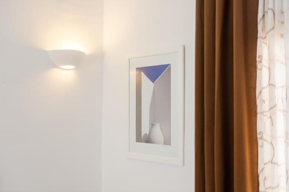 Double Room, Partial Sea View | Iron/ironing board, free WiFi, bed sheets